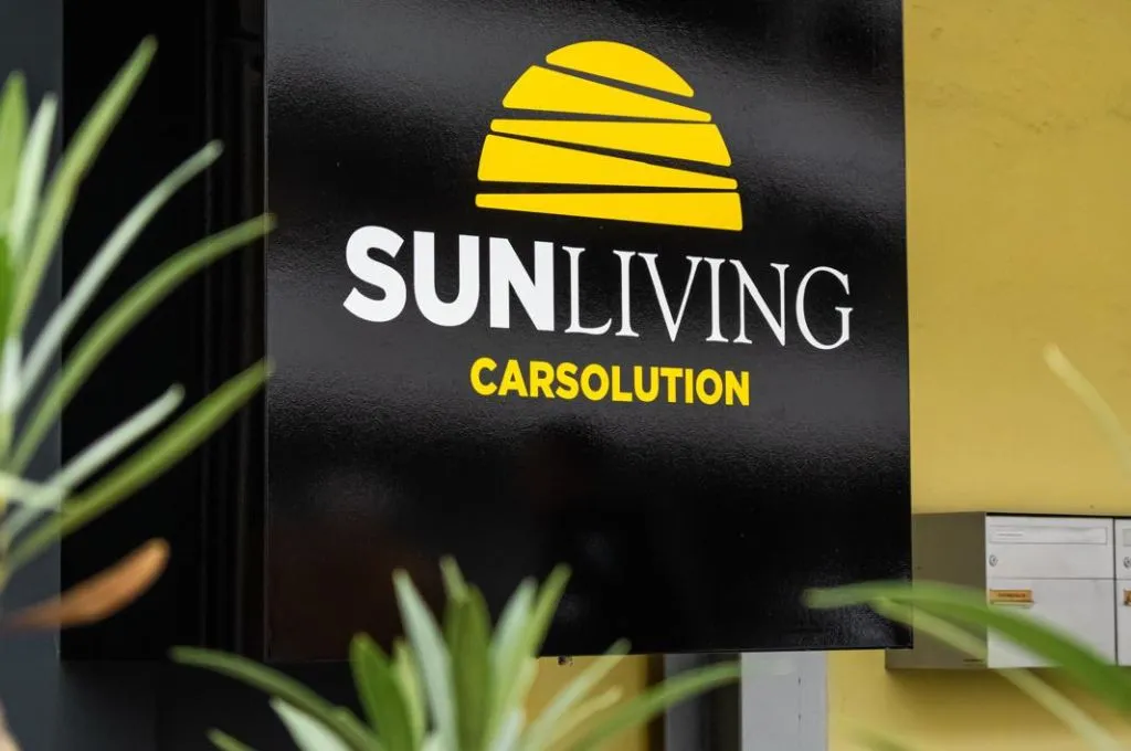 Sign of SunLiving Carsolution, operator of Roadster4rent